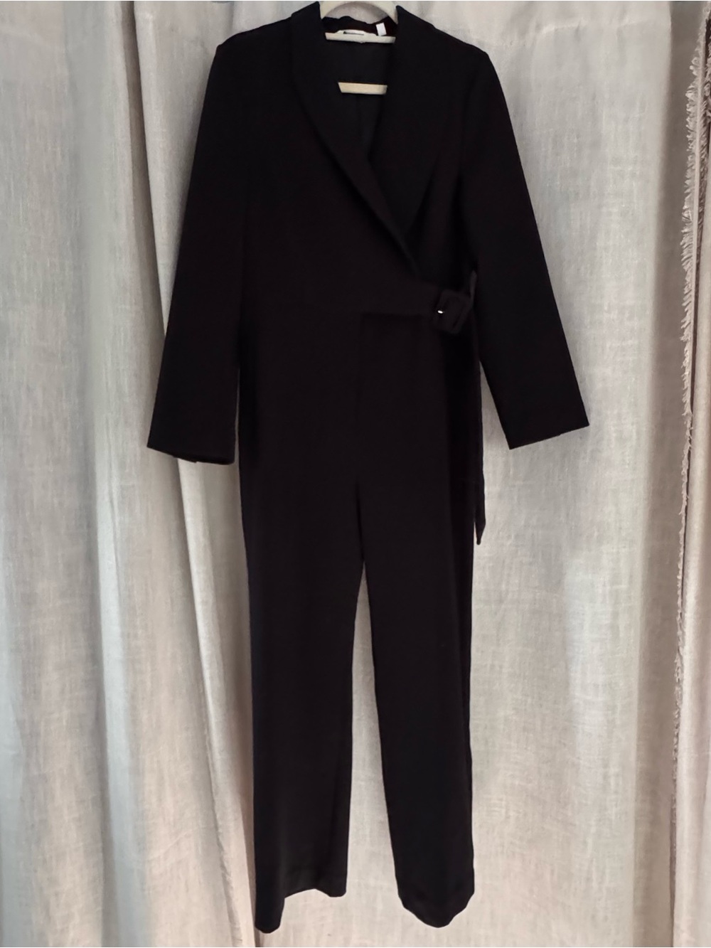 Black long sleeve collared one piece jumpsuit size 8